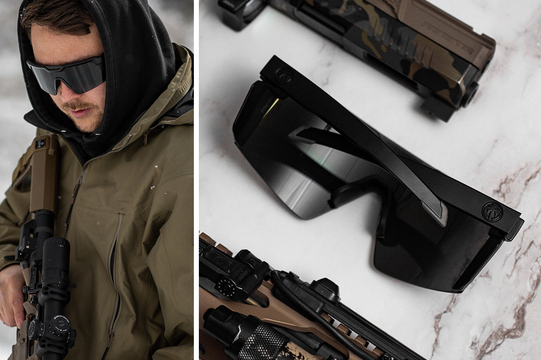 Man in the cold wearing Heat Wave Visual Future Tech Sunglasses with black frame and black lens.