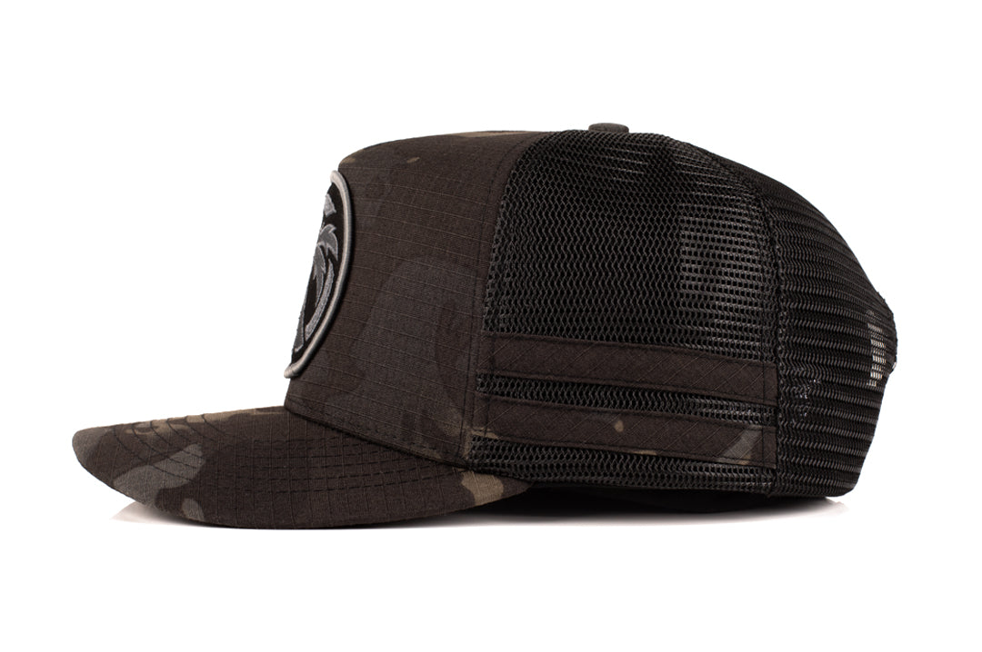 Side view of the Heat Wave Visual Icon Midnight Trucker Hat. 
