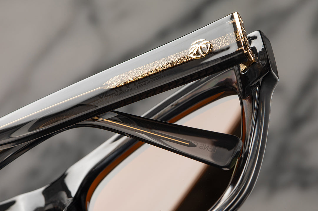 Close up detail of the arms on the Heat Wave Visual Marylin Sunglasses with quartz frames and rose gold lenses.