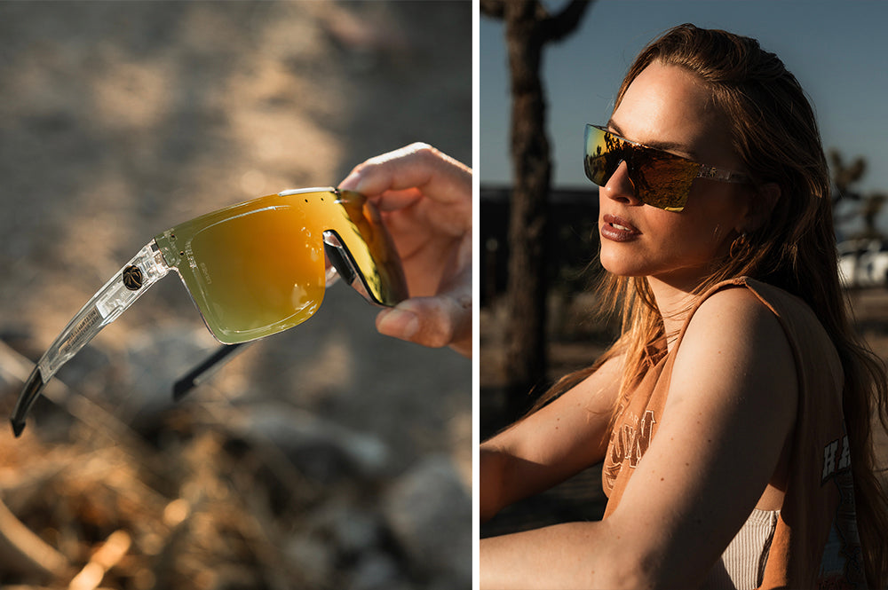 Young woman wearing Heat Wave Quatro Vapor Clear Sunblast safety sunglasses and a close up of a hand holding them.