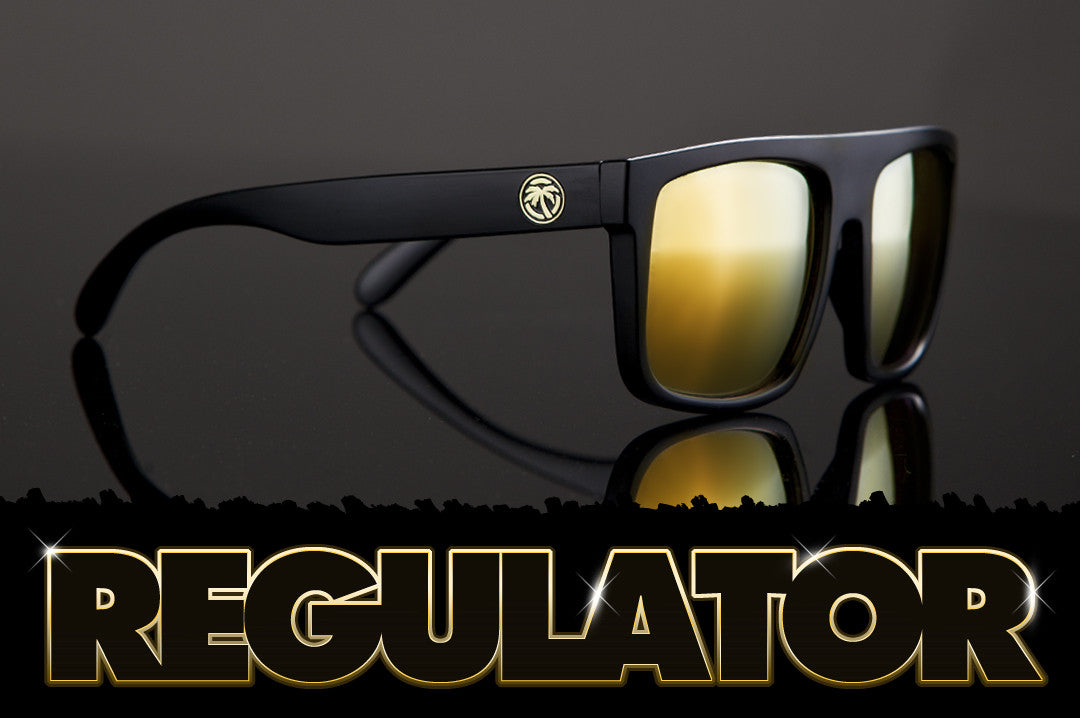 Heat Wave Visual Regulator Sunglasses with black frame and gold lenses.