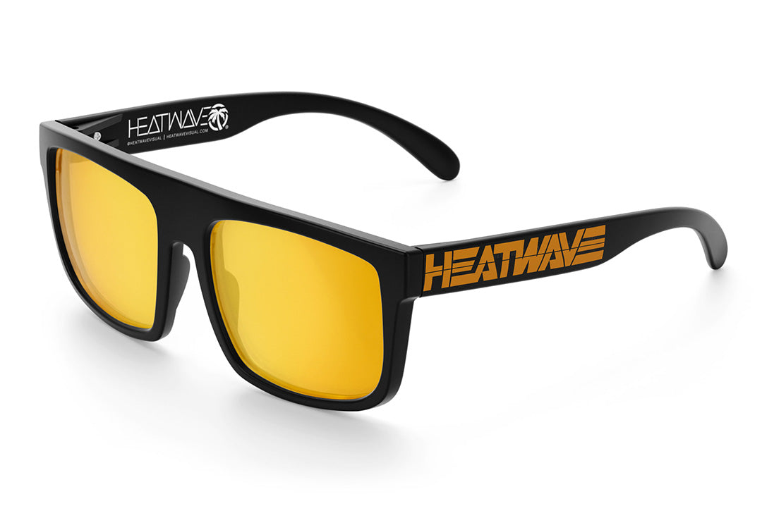 Heat Wave Visual Regulator Sunglasses with black frame, gold billboard print arms and gold lenses.