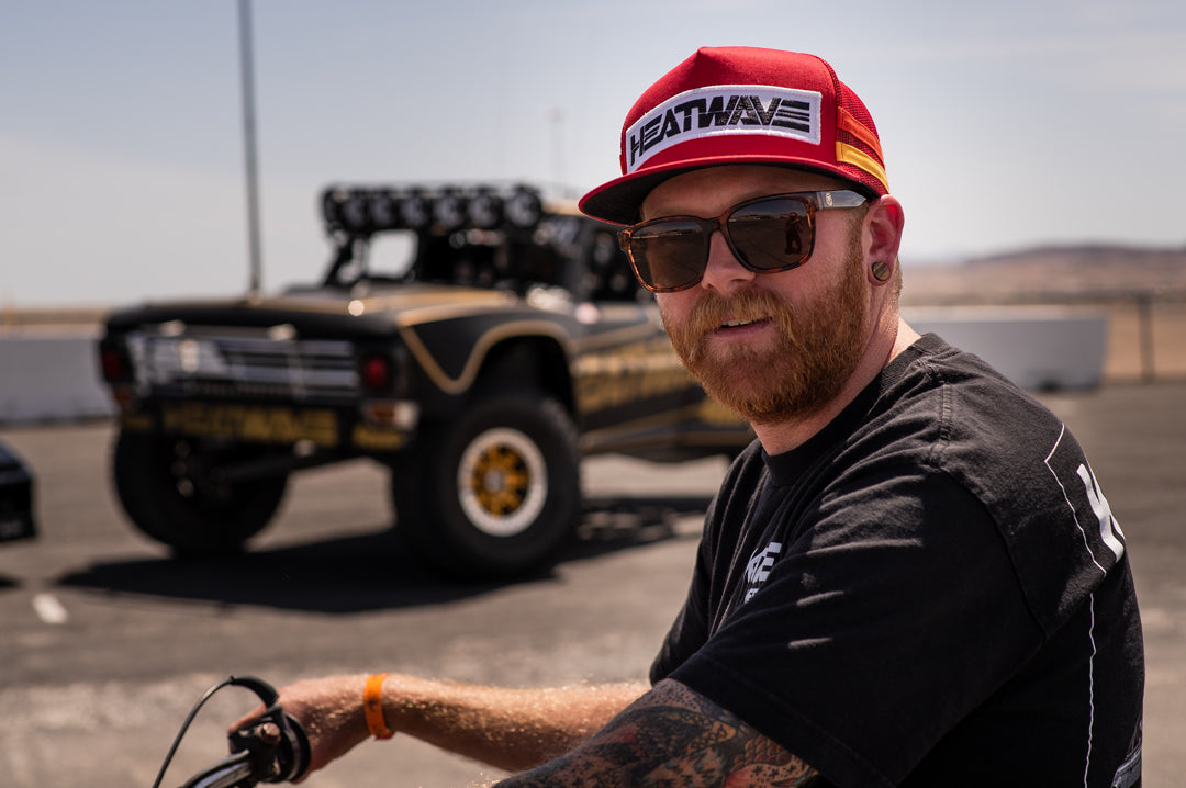 Race truck driver Nick Isenhour wearing Heat Wave Visual Apollo Sunglasses with tortoise brown frame and brown gradient lenses.