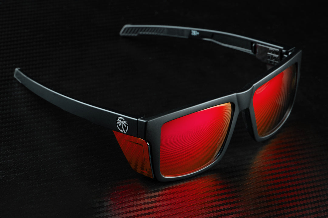 Top view of the Heat Wave Visual Performance XL Vise Sunglasses with black frame, firestorm red lenses and matching colored side shields.