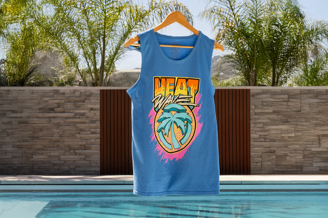 Heat Wave Visual Intense Blue Tank Top hanging out by the pool.