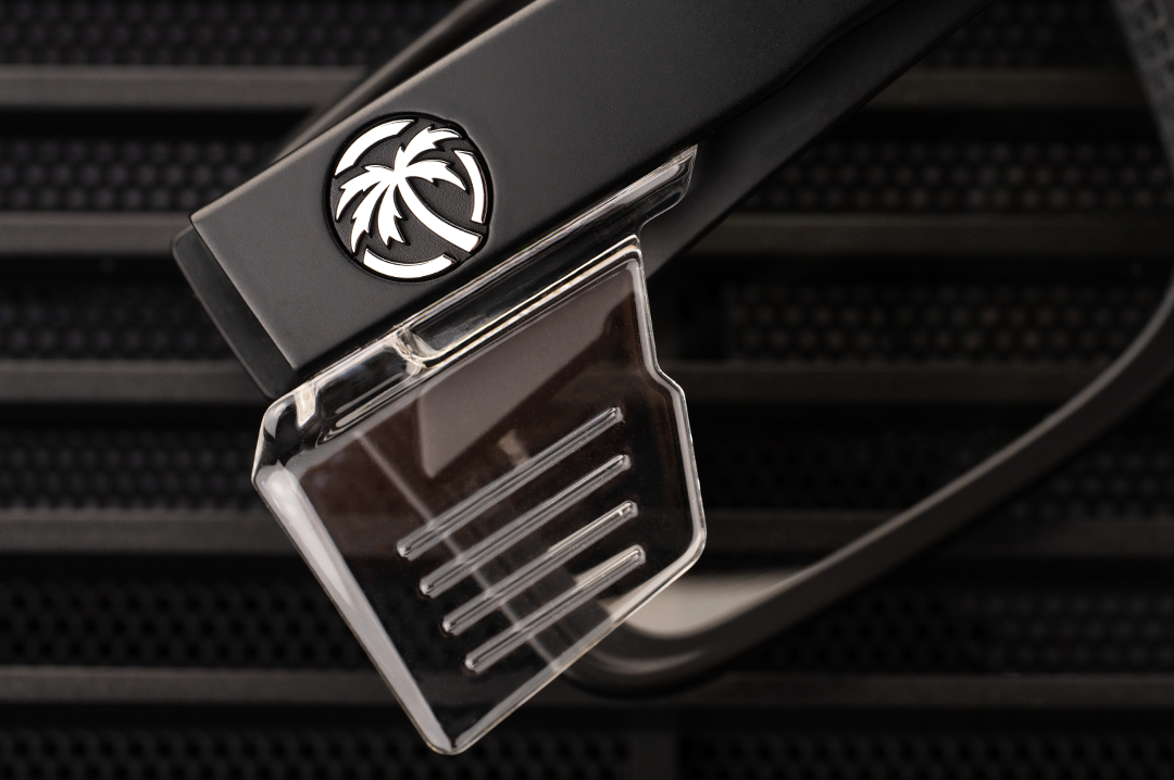 Close up on the Heat Wave Visual Performance Rayth Sunglasses with black frame, anti-fog clear lenses and clear side shields.