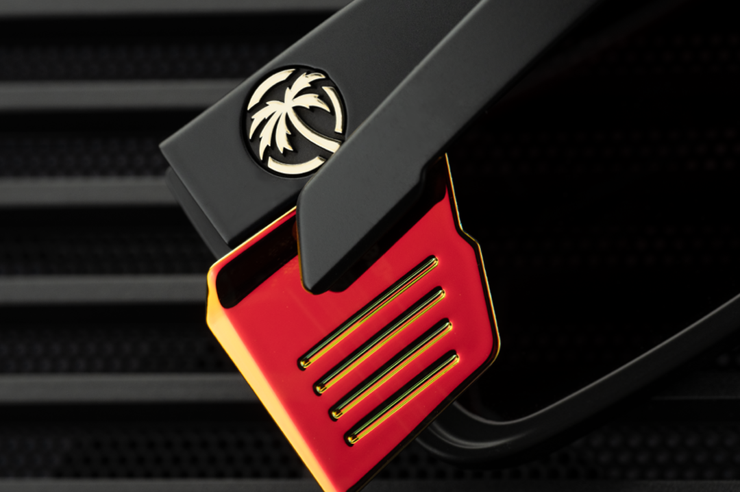 Close up of the side shield on the Heat Wave Visual Performance Rayth Sunglasses with Firestorm red lenses.